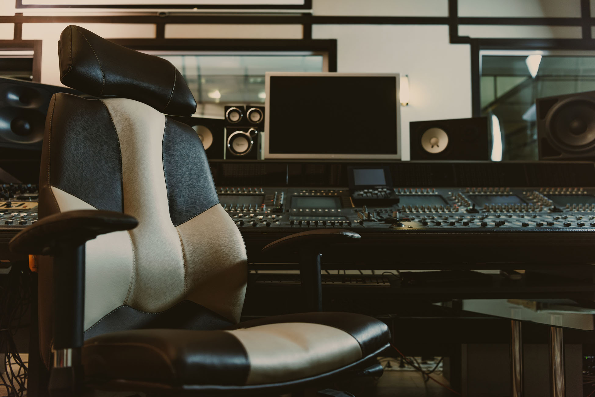 armchair in front of graphic equalizer at recording studio armchair in front of graphic equalizer at recording studio